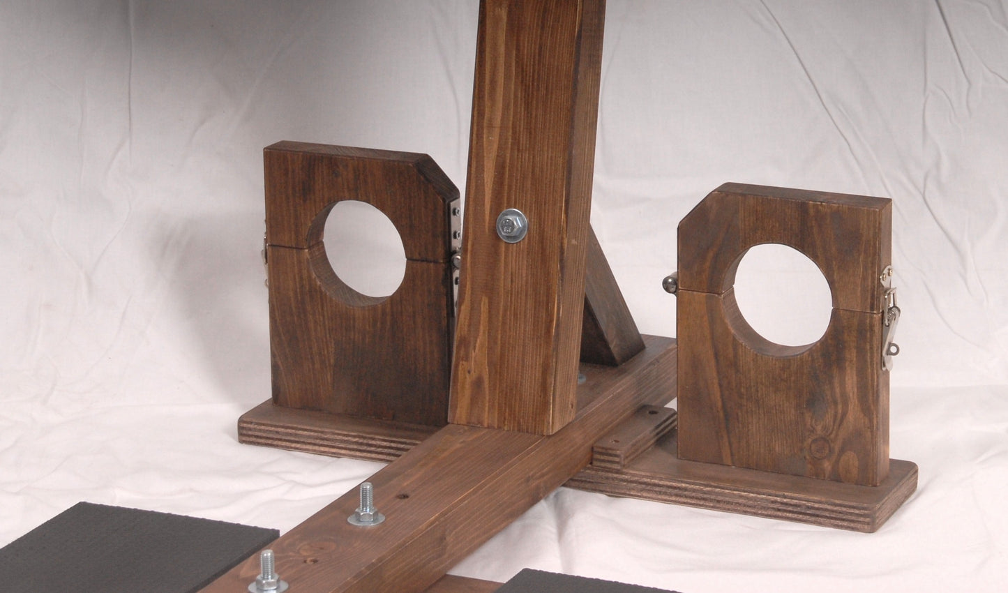 High-quality wood and metal BDSM furniture – domination hanger with ankle and wrist stocks.