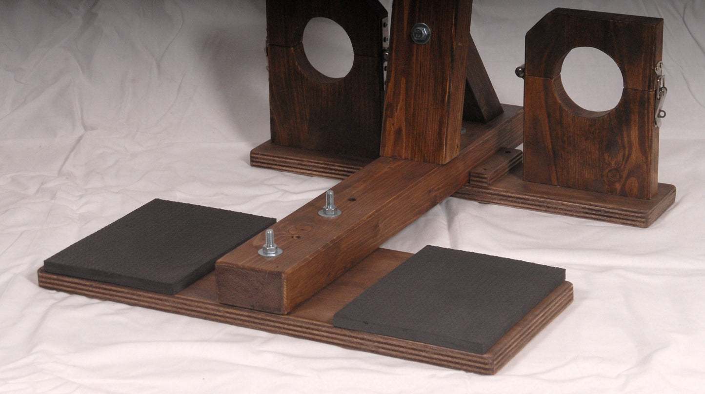 Close-up of ankle restraints on the domination kneeling bench.
