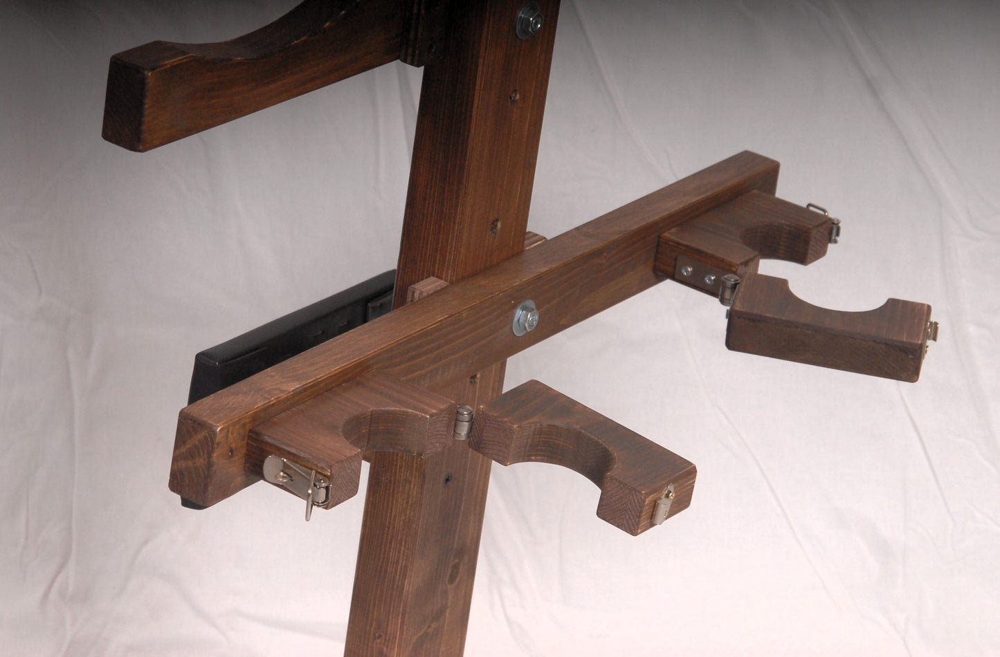 Close-up of wrist restraints on the domination kneeling bench.