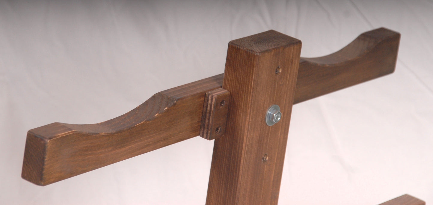Close-up of wrist restraints on the domination kneeling bench.