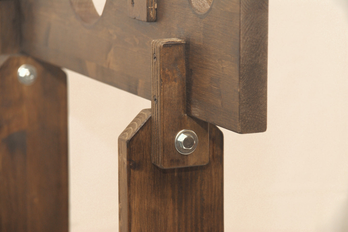 Side view of life-size bondage stocks with classic design – ideal for restraint play and historical dungeon setups