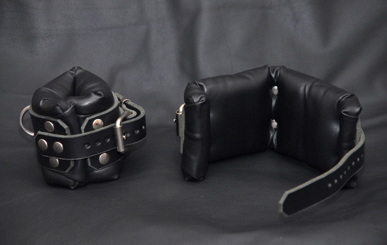 Bondage Padded Wrist Restraints with roller buckle and D ring - Black Leather - BDSM