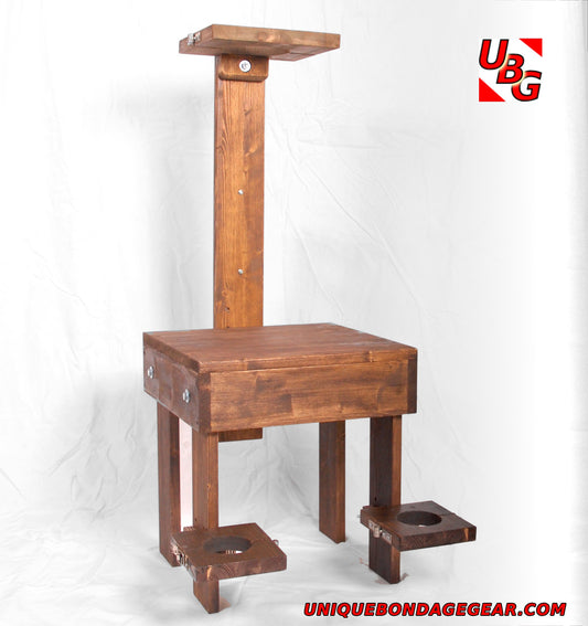 Wooden BDSM interrogation chair with wrist, ankle, and neck stocks.