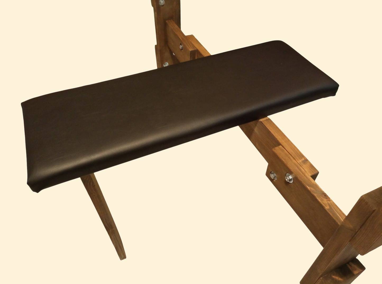 Handmade wooden BDSM breeding bench with leather restraints