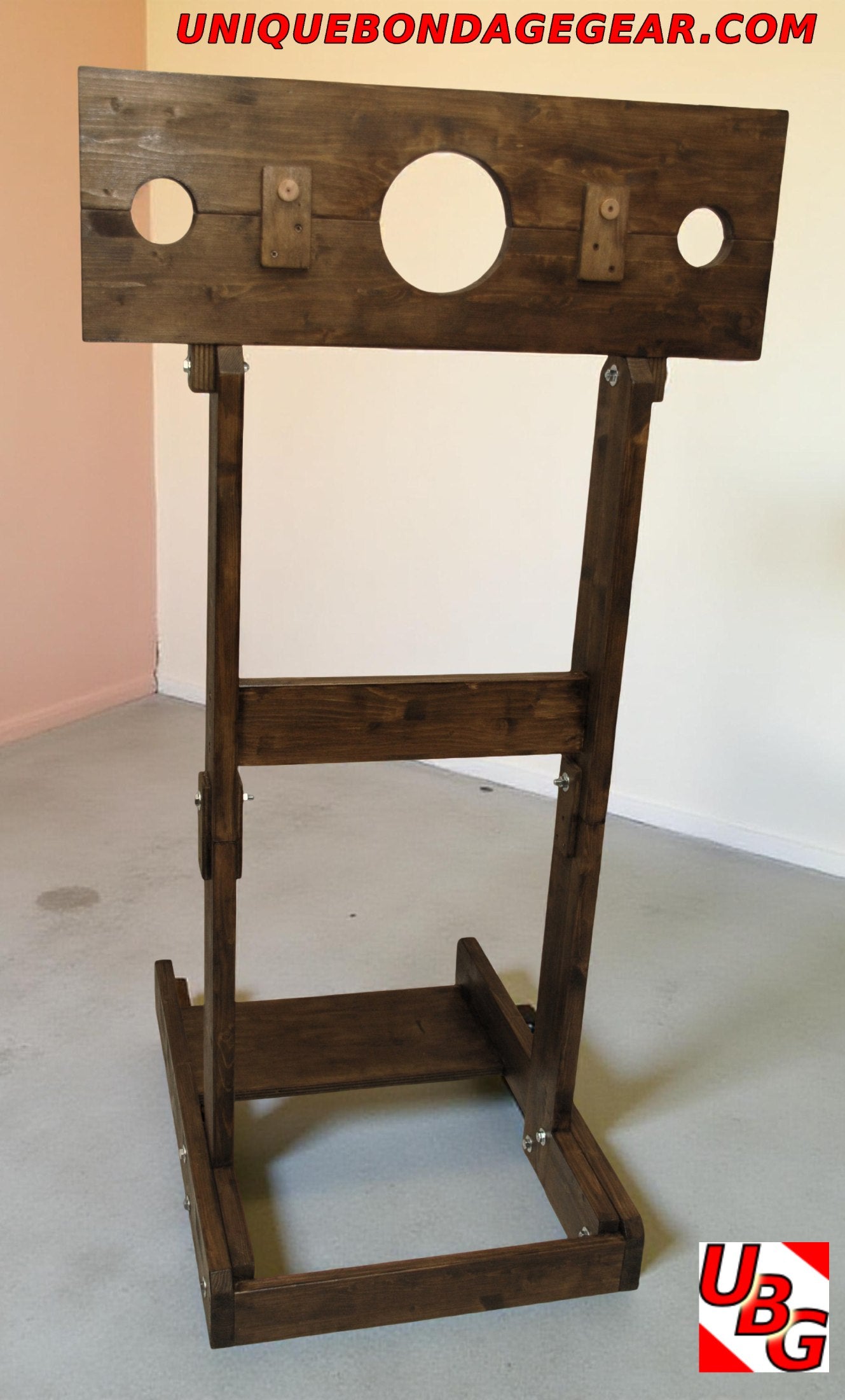 Demountable medieval pillory for BDSM dungeon use – walnut-stained wood with adjustable neck and wrist holes